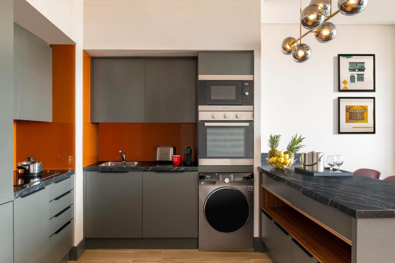 Swissotel Living Jeddah Bagian luar foto A typical kitchen in a serviced apartment